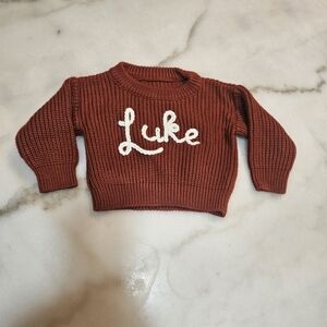 Rust Knit Sweater with White Script